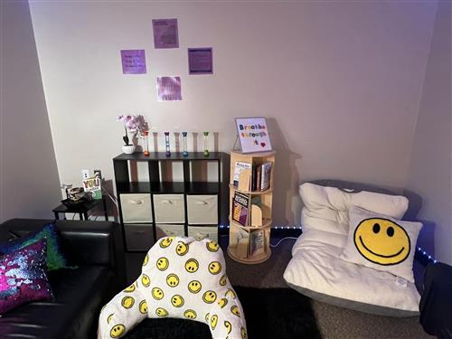 A pillow and sensory table section